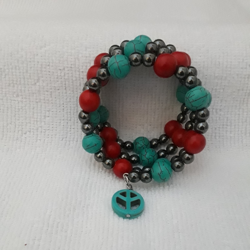 Stone bracelet with stone charm.